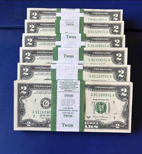 Two dollar bills - ($2),