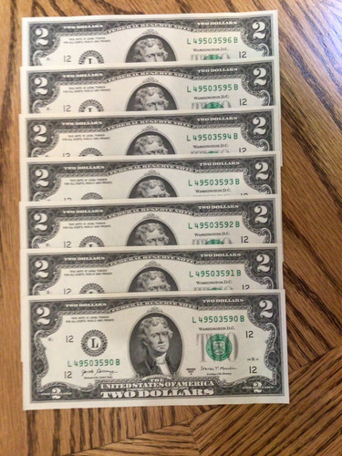 Two dollar bills - ($2,